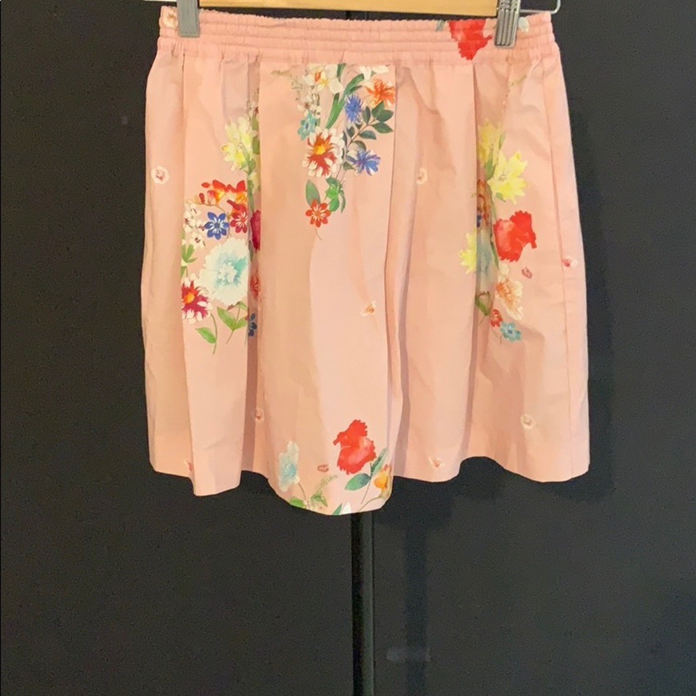 Girls pink flowery skirt with pockets